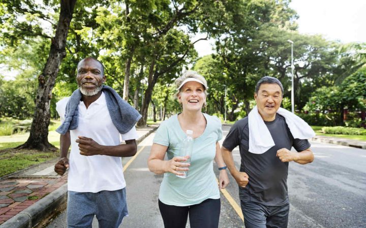 group-senior-friends-jogging-together-park_Easy-Resize.com