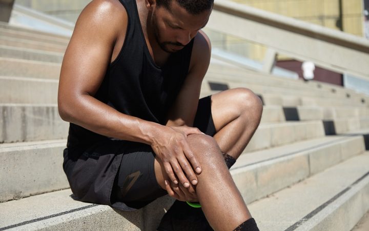 handsome-muscular-male-jogger-wearing-black-traini-755ER22