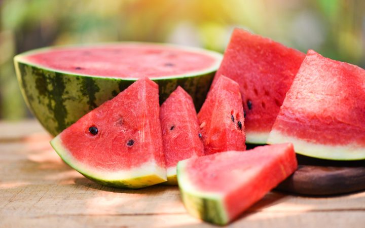 sliced-watermelon-wooden-nature-close-up-fresh-watermelon-pieces-tropical-summer-fruit